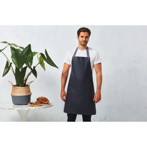 Tablier “effet ciré” à bavette “District” 1 Tablier "effet ciré" à bavette "District"