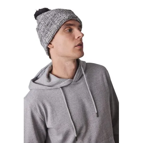 Bonnet à pompon avec revers